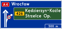 Tablica przeddrogowskazowa na autostradzie - Informuje o skrzyżowaniu lub węźle na autostradzie