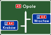 Tablica przeddrogowskazowa przed wjazdem na autostradę - Wskazuje zjazd lub wjazd na autostradę